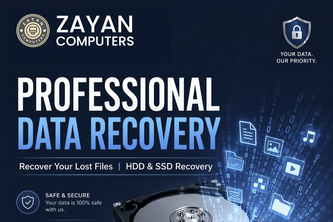 Professional data recovery technician working with hard drives and storage devices